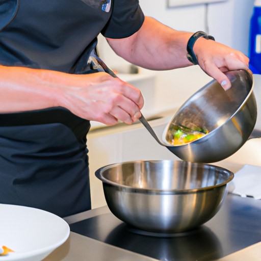 A professional chef cooking in a well-equipped kitchen.